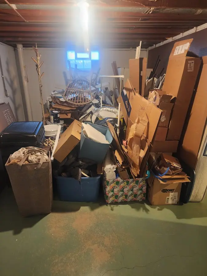 Roll-off dumpster container at job site for Yard Waste Dumpster Rental in Garnet